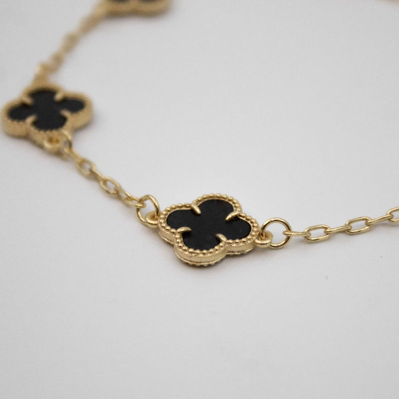 PULSEIRA 5 TREVOS BLACK BANHADO A OURO 18K